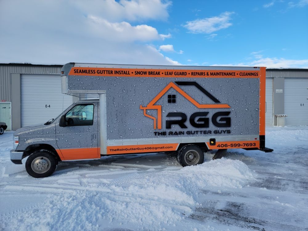 A gray and orange work truck for