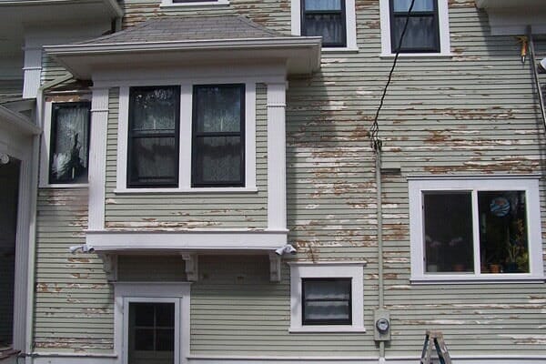 Old House with a Rusty Wall — Interior and Exterior Painting Service in Clackamas, OR