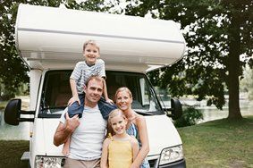 Family Standing Next to RV — Vehicles Insurance in Cambridge, MD