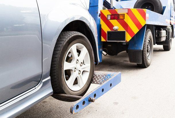 Truck Towing Car — Virginia Beach, VA – London Bridge Motor Co