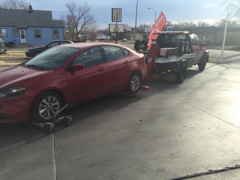 Towing a Yellow Car — Junction City, KS — Homestead Tow Service