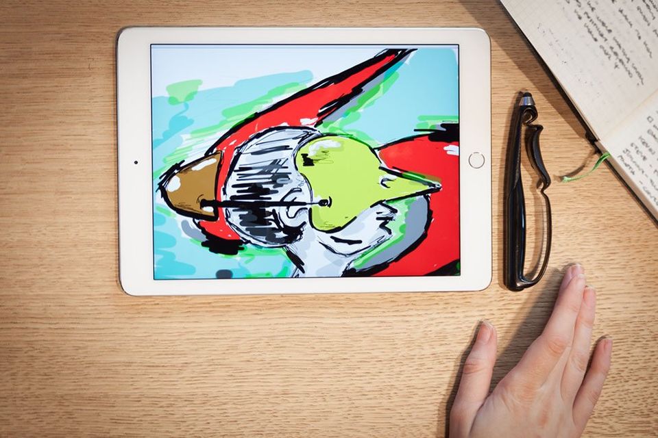 A Scriba stylus and a tablet displaying a drawing