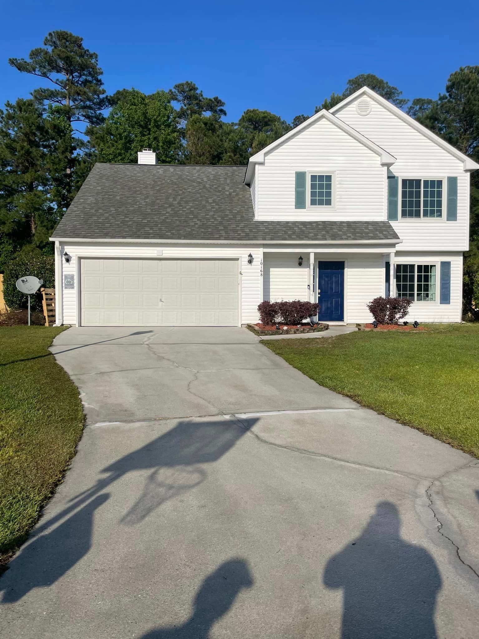 A White House With A Gray Roof — Leland, NC — Coastal Exterior Solutions