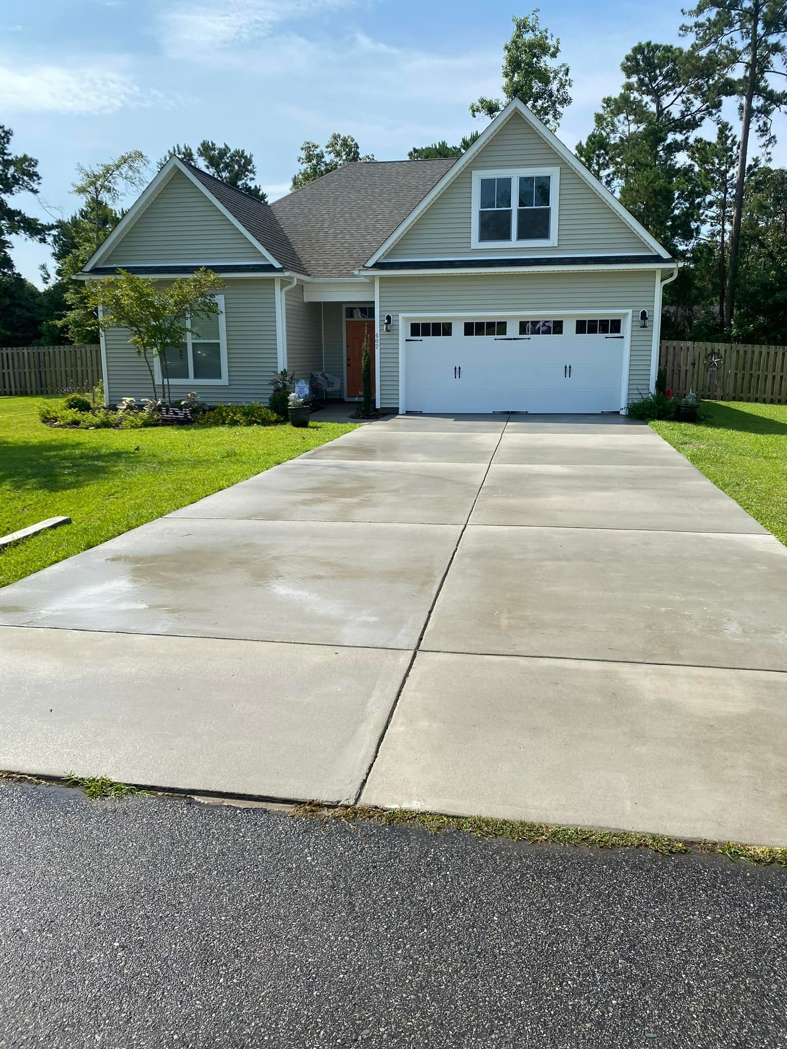 A House With A Large Driveway — Leland, NC — Coastal Exterior Solutions