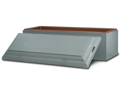 Gray wooden coffin with open lid.