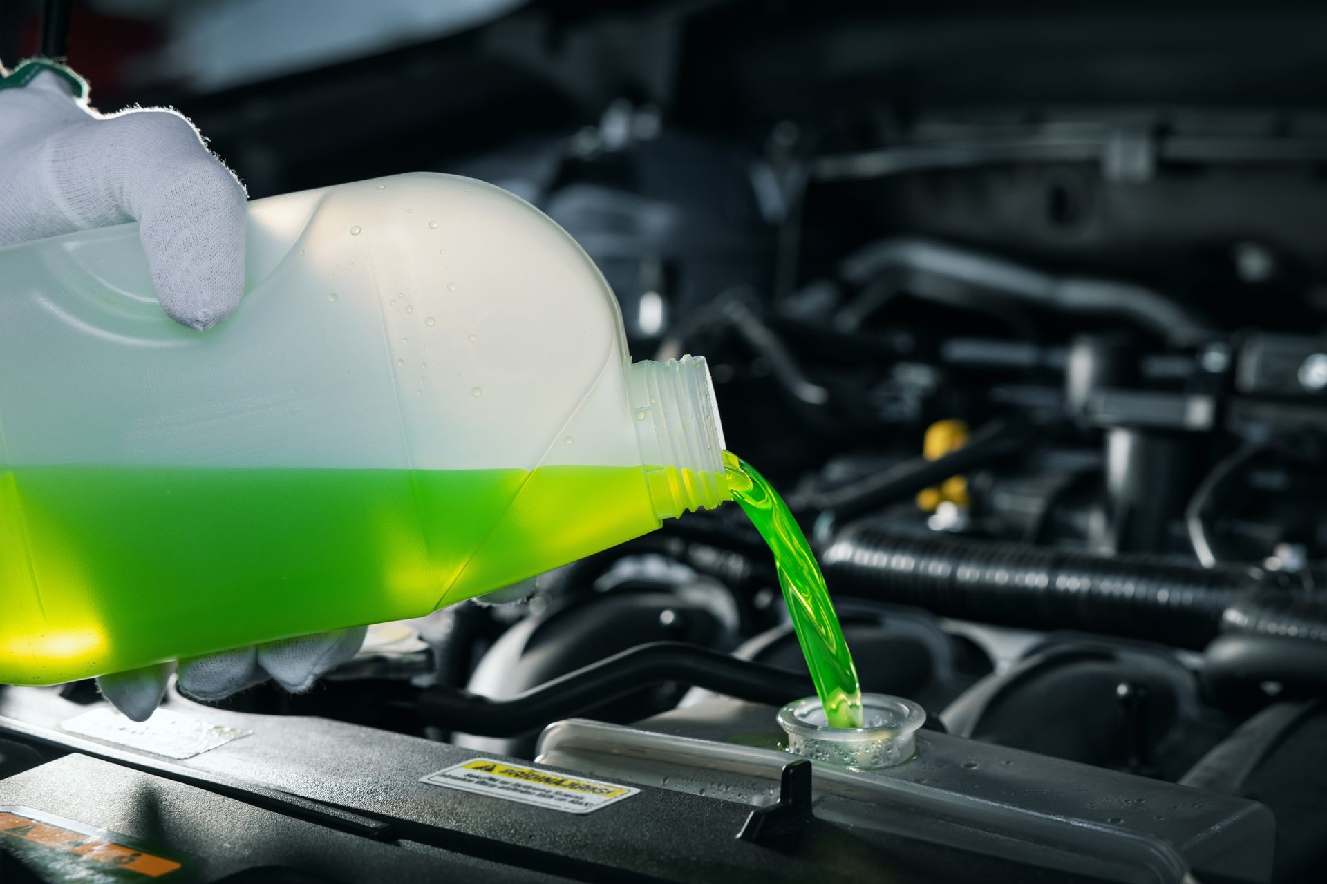 Coolant being poured into a radiator | Buckley's Auto Care Millsboro