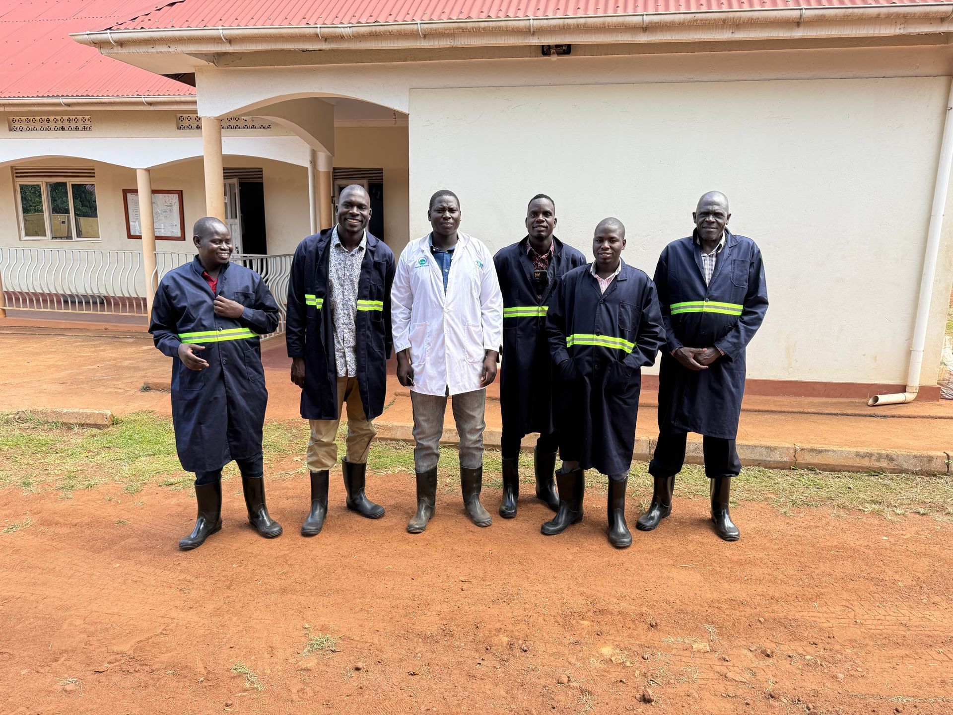 Visitors touring a community nutrition and poultry project.