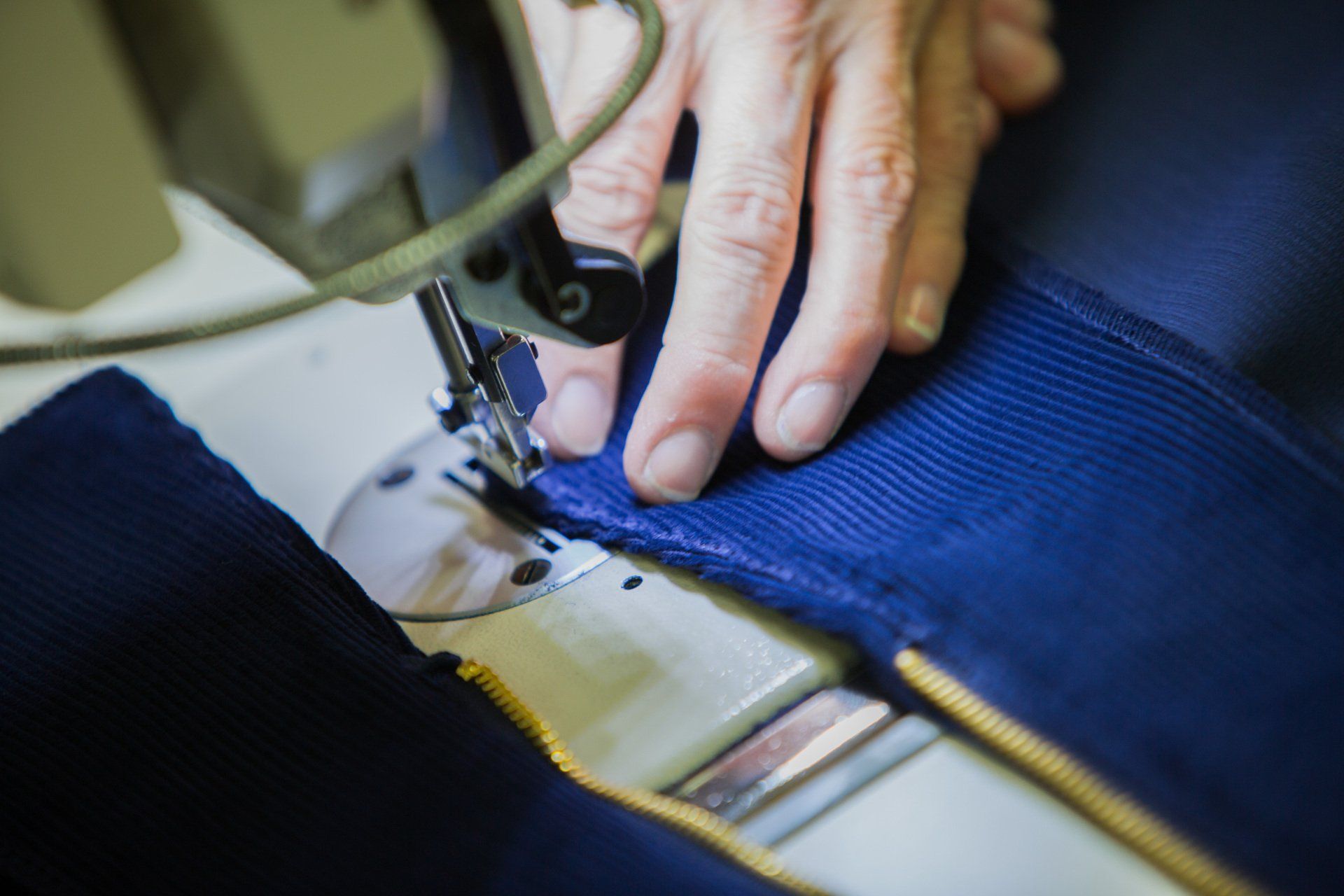 A FFA jacket being sewed together.