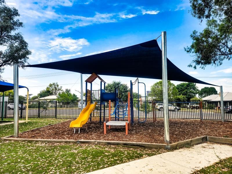 A Hot Tub Is Covered by A Shade Sail in The Backyard of A House — New England Shade Sails in North Tamworth, NSW