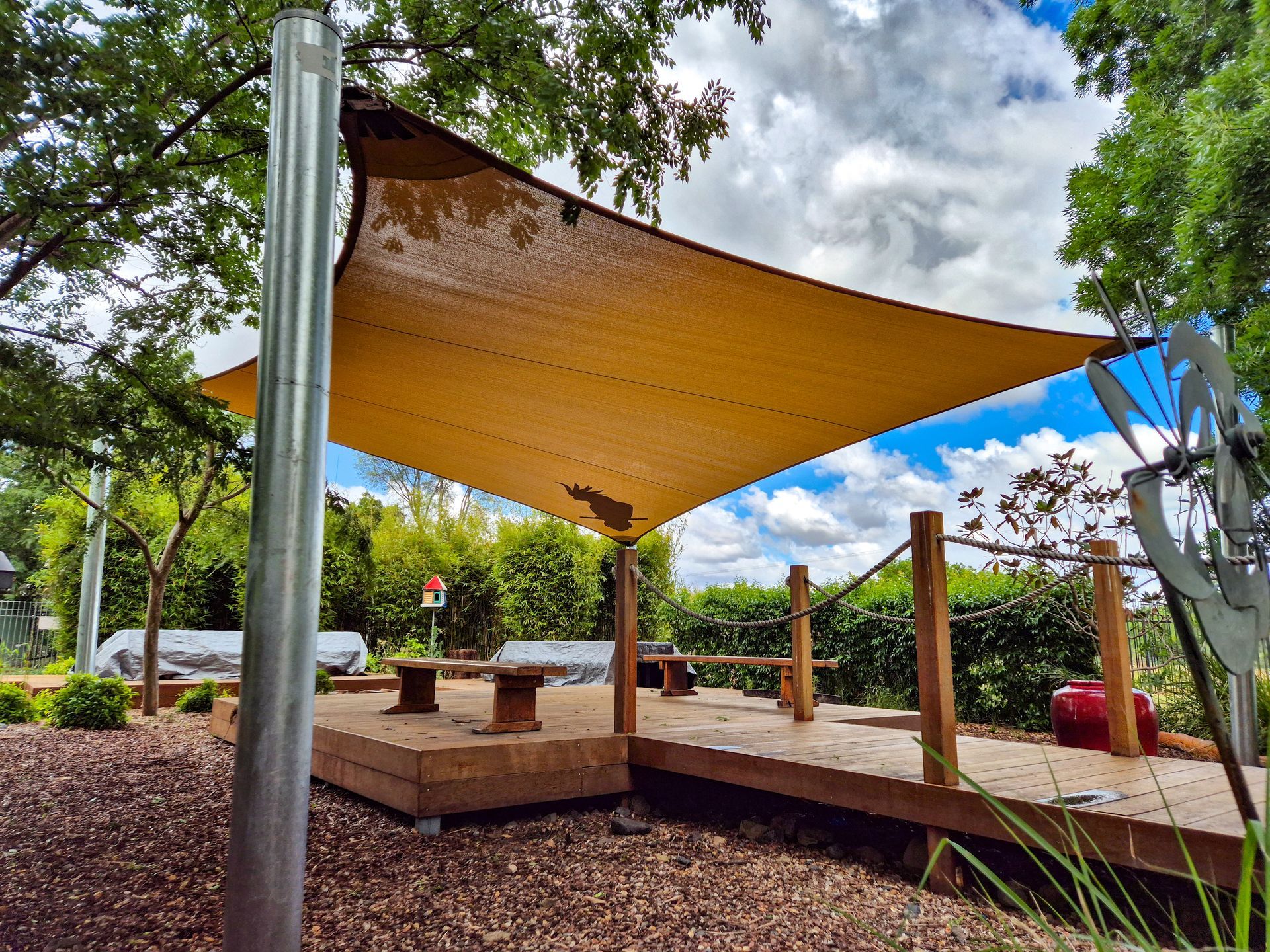 A View of A Playground from A Balcony with A Building in The Background — New England Shade Sails in North Tamworth, NSW 
