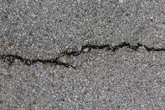 asphalt crack needs repair