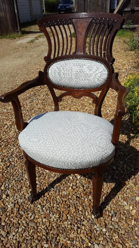 Chair repaired, re-polished & re-upholstered