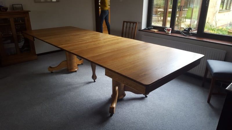 table stripped to natural finish from dark oak