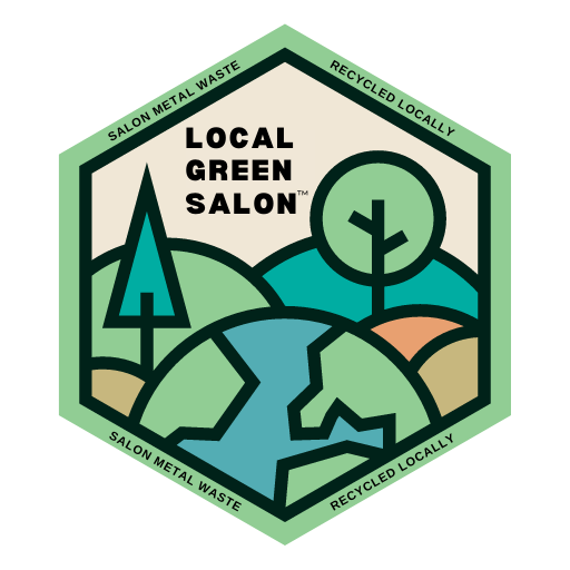 A logo for local green salon with trees and mountains