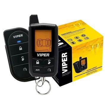 A viper remote control is sitting next to a viper box.