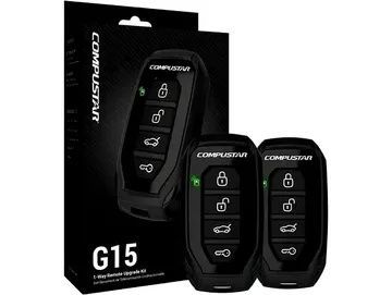 A couple of remote controls sitting next to each other in a box.