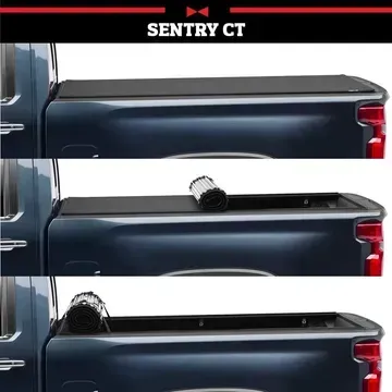A blue truck with a sentry ct bed cover on it