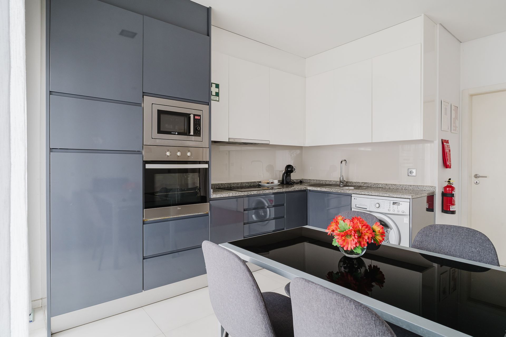 650 meters from the University of Minho - Braga, Portugal A white house with a red door and a white picket fence