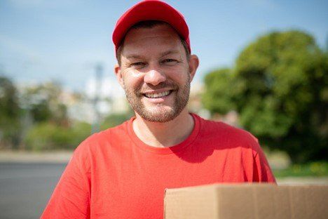 Food delivery guy smiling