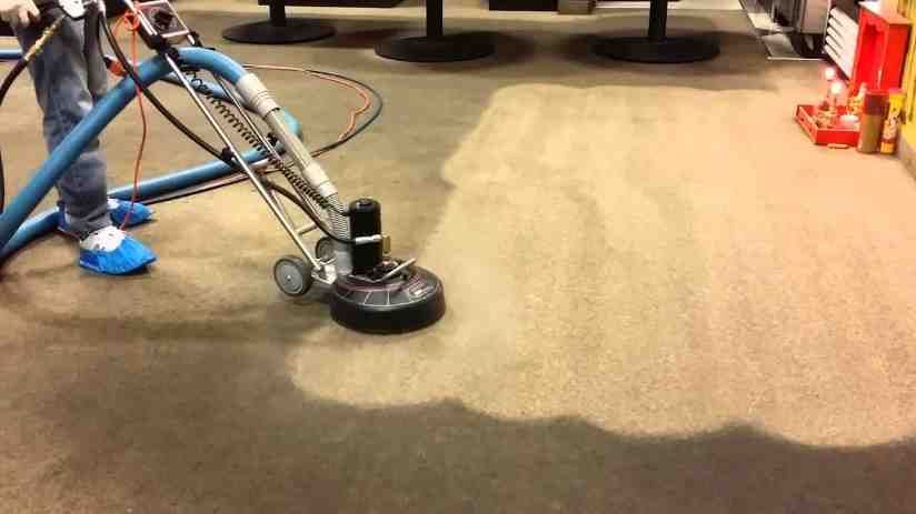 carpet cleaner using eco-friendly products on a carpet - natural carpet cleaning near me