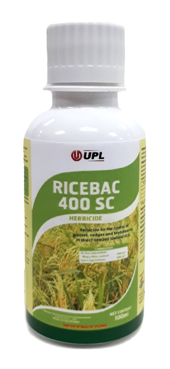 Bottle of Ricebac 400 SC herbicide, with a green and white label, a picture of rice in the background.