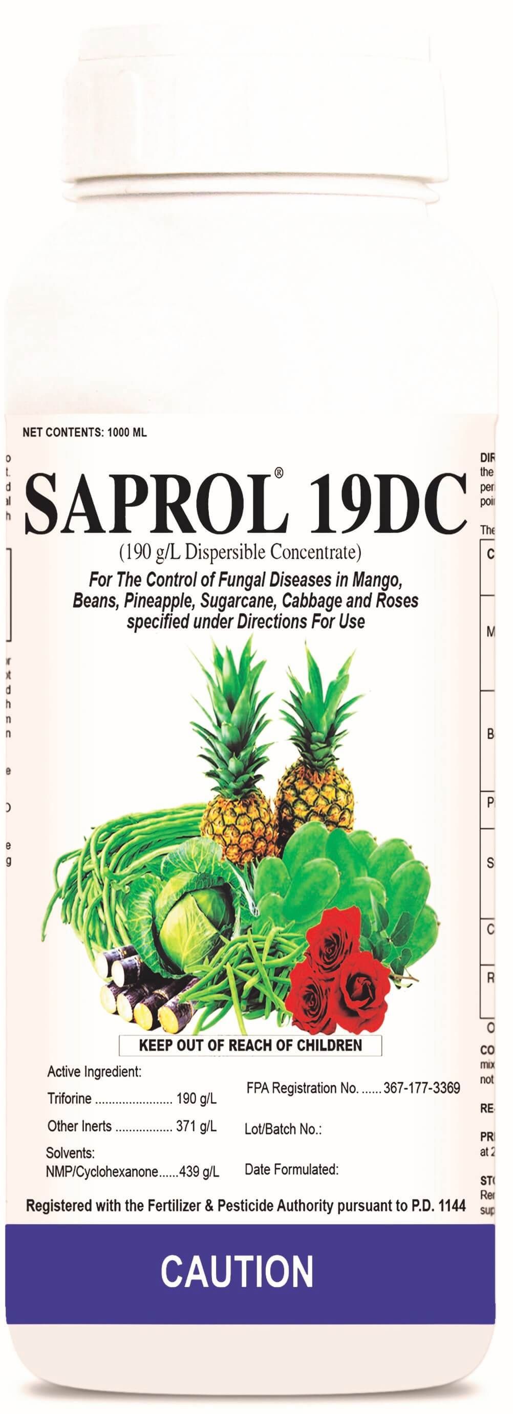 Bottle of Saprol 19DC pesticide with illustrations of pineapples, cabbage, and roses. Caution label at the bottom.