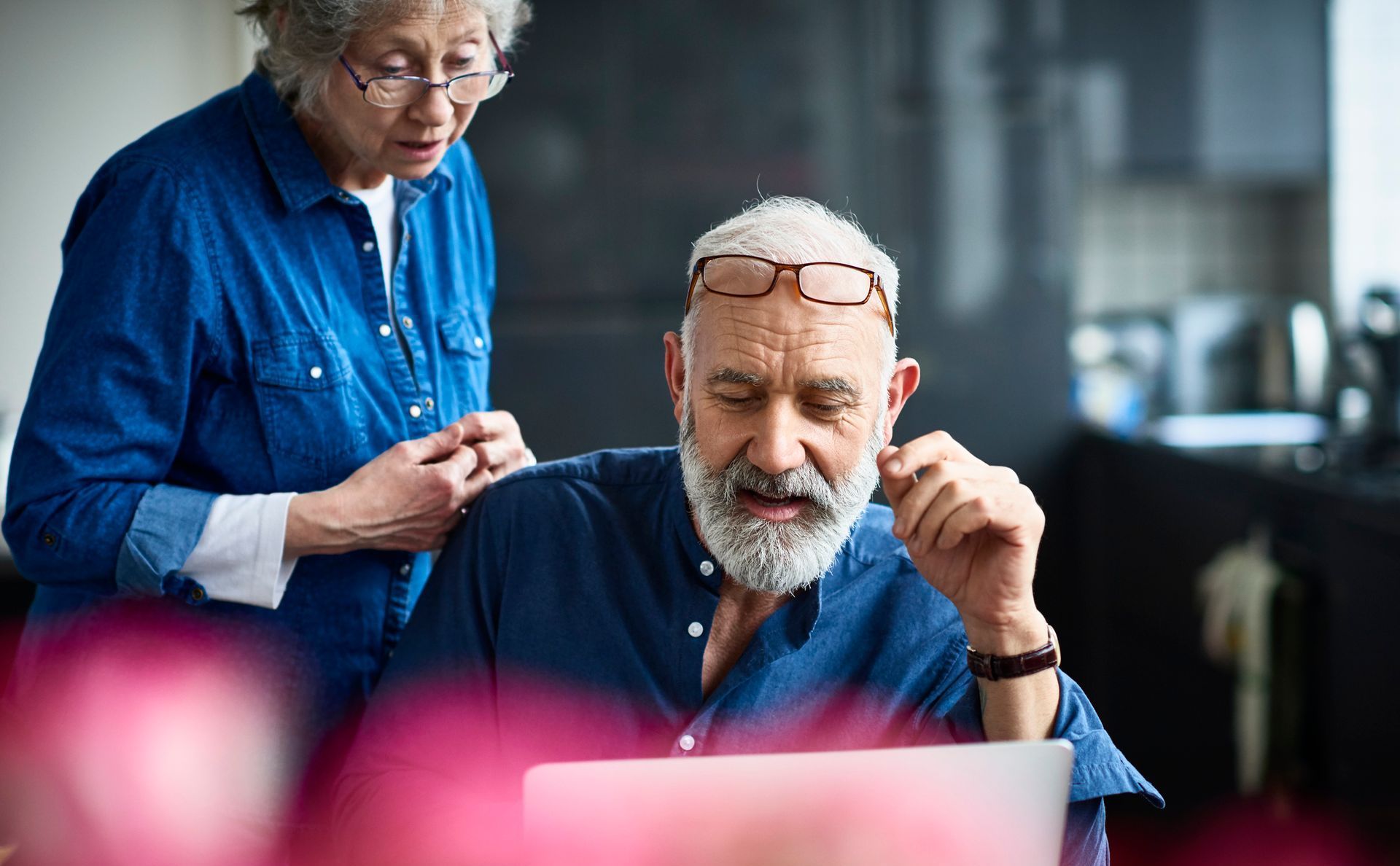 A social security disability claim form with a pen and calculator — Willmar, MN — Schneider & Madsen PC