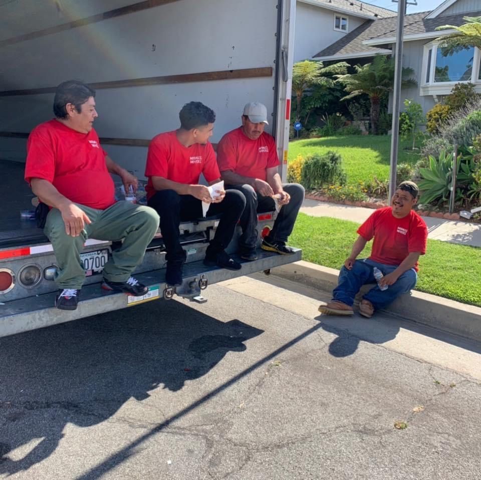 Junk Guys LA team of professional junk haulers in uniforms, preparing for a residential or commercial junk removal job.