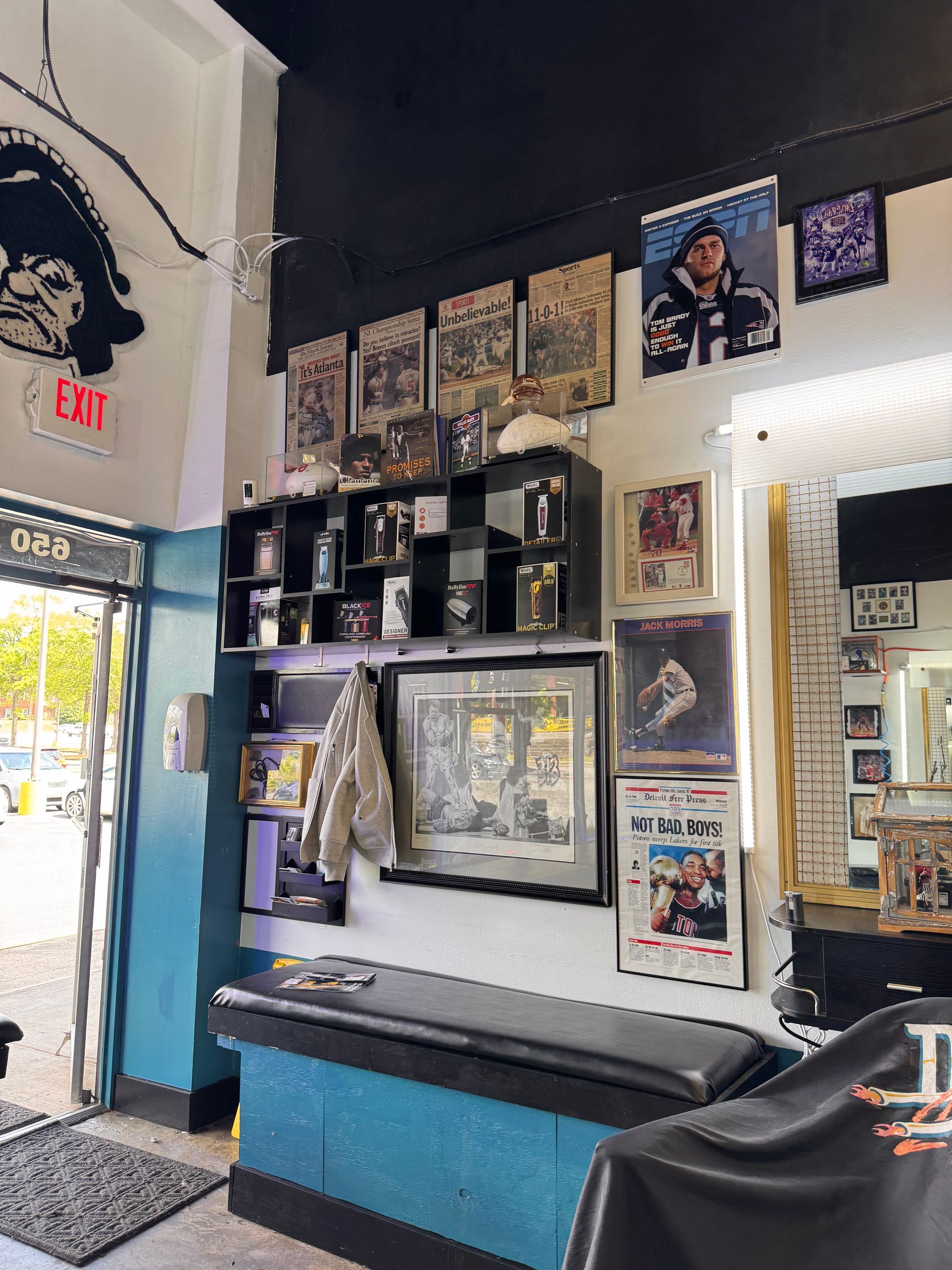 A barber shop with a sign that says exit