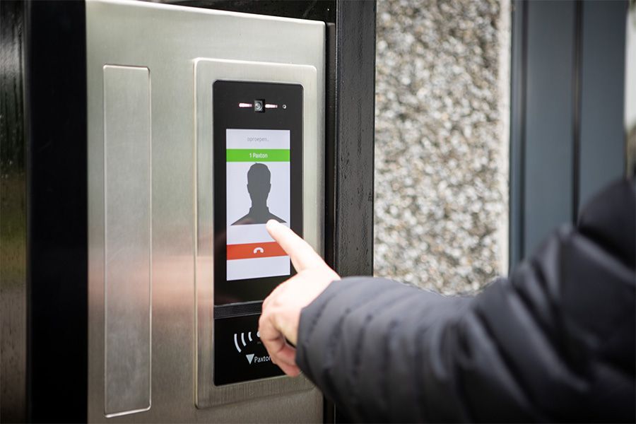 A person is using a smart phone to make a call.
