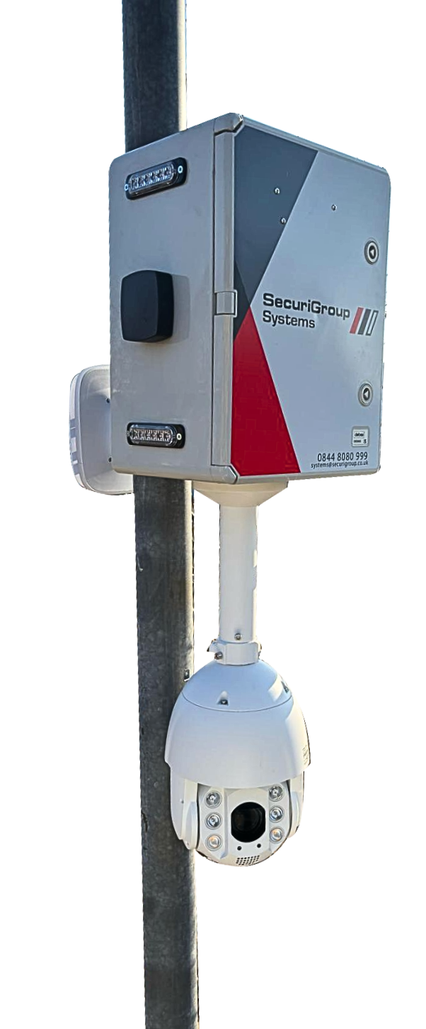A camera is hanging from a pole next to a box.