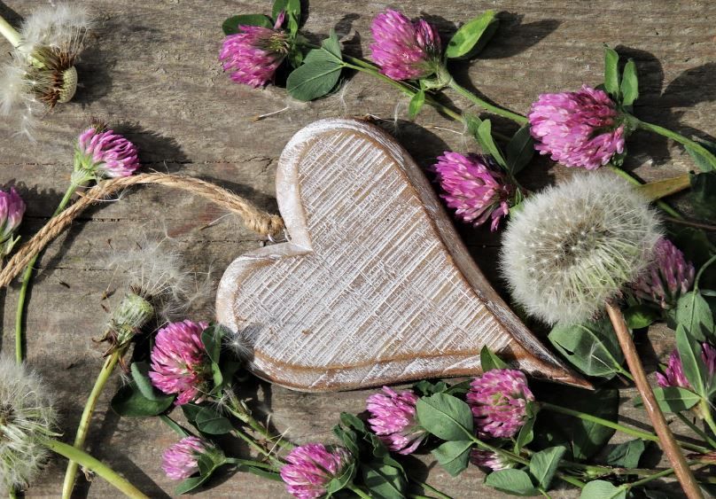 Handcrafted heart decor among wildflowers, personalized memorial art, cremation services Moore, OK