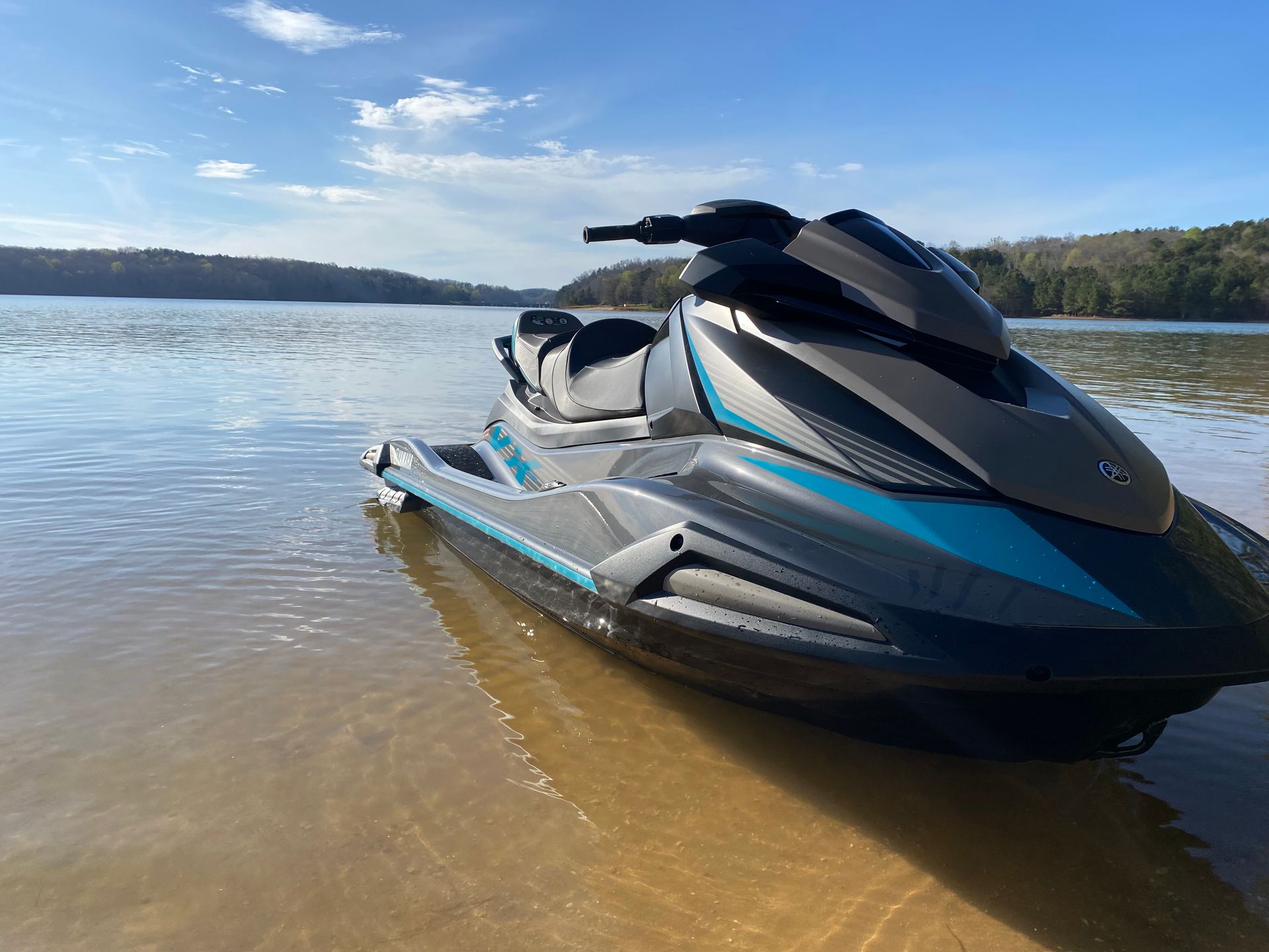 Lake Hartwell jet ski rental parked on the beach.