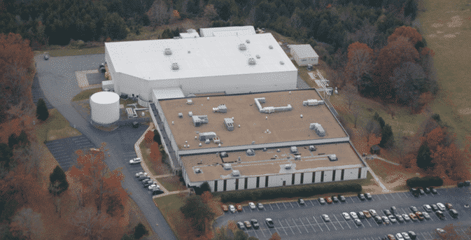 Packaging Company in Greene County, VA: An aerial view of a large building with a white roof