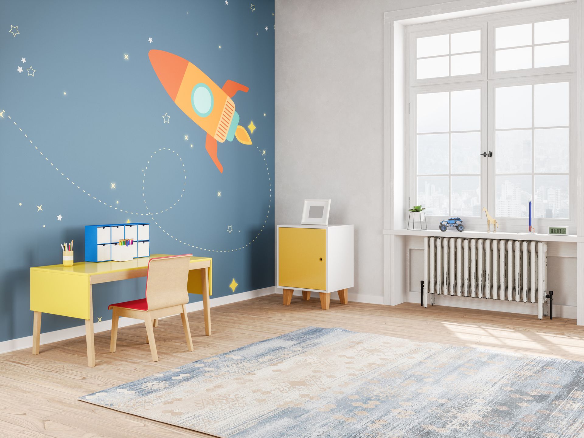 A child 's room with a rocket painted on the wall.