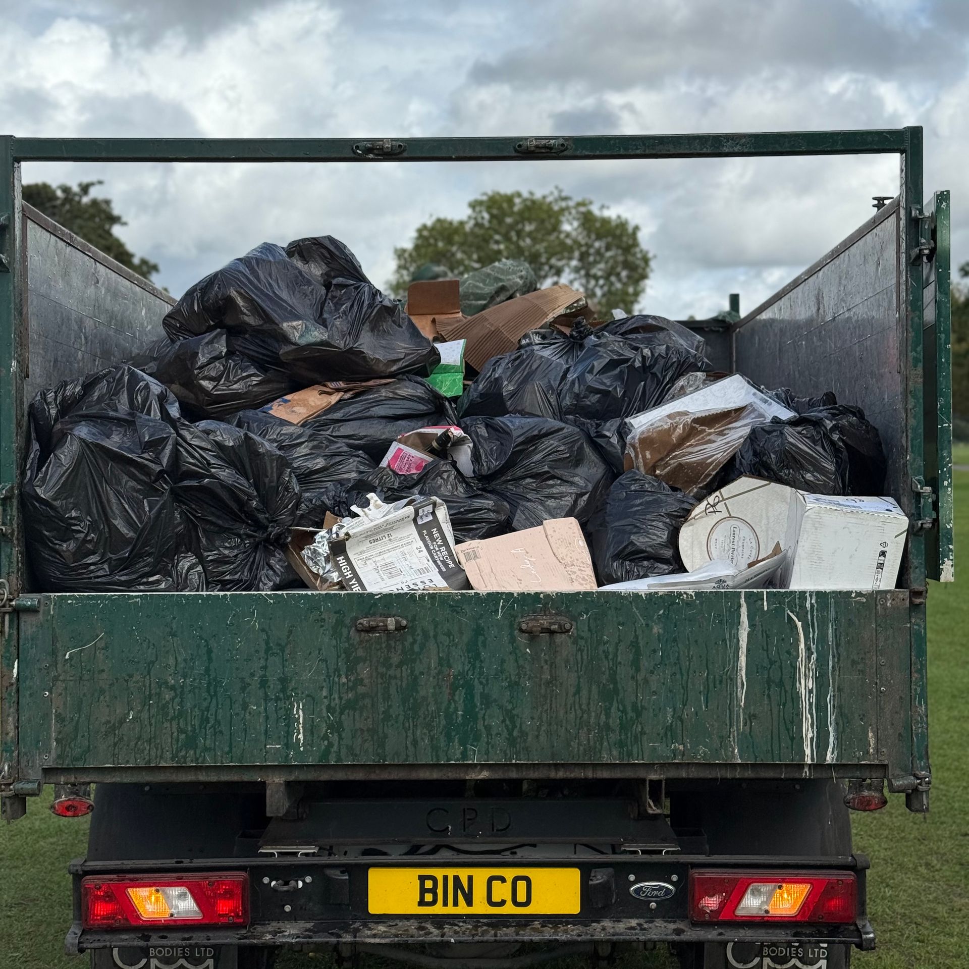 Rubbish removal vehicle Full Load Black bags, cardboard and glass bottle. this vehicle collected waste from henley on thames 