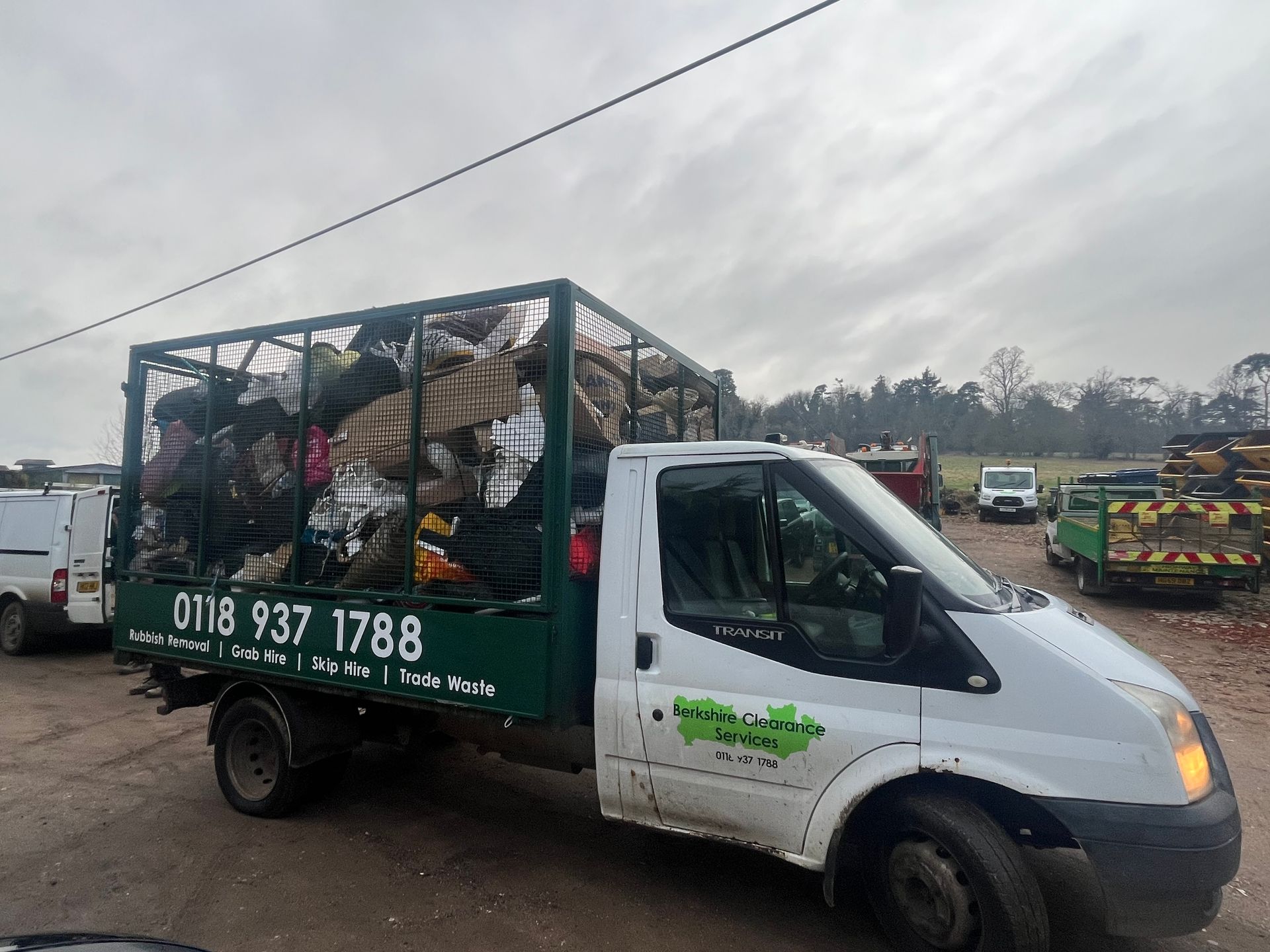 Same Day Waste Collection Across Berkshire by Berkshire Clearance Services using a branded Ford Transit cage tipper loaded with rubbish waste for domestic and commercial waste removal in Reading and Berkshire. Trusted by tenants, landlords and businesses with 655+ Google reviews.