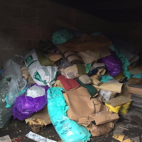 CARPET WASTE PILED UP READY FOR WASTE COLLECTION IN WEST READING