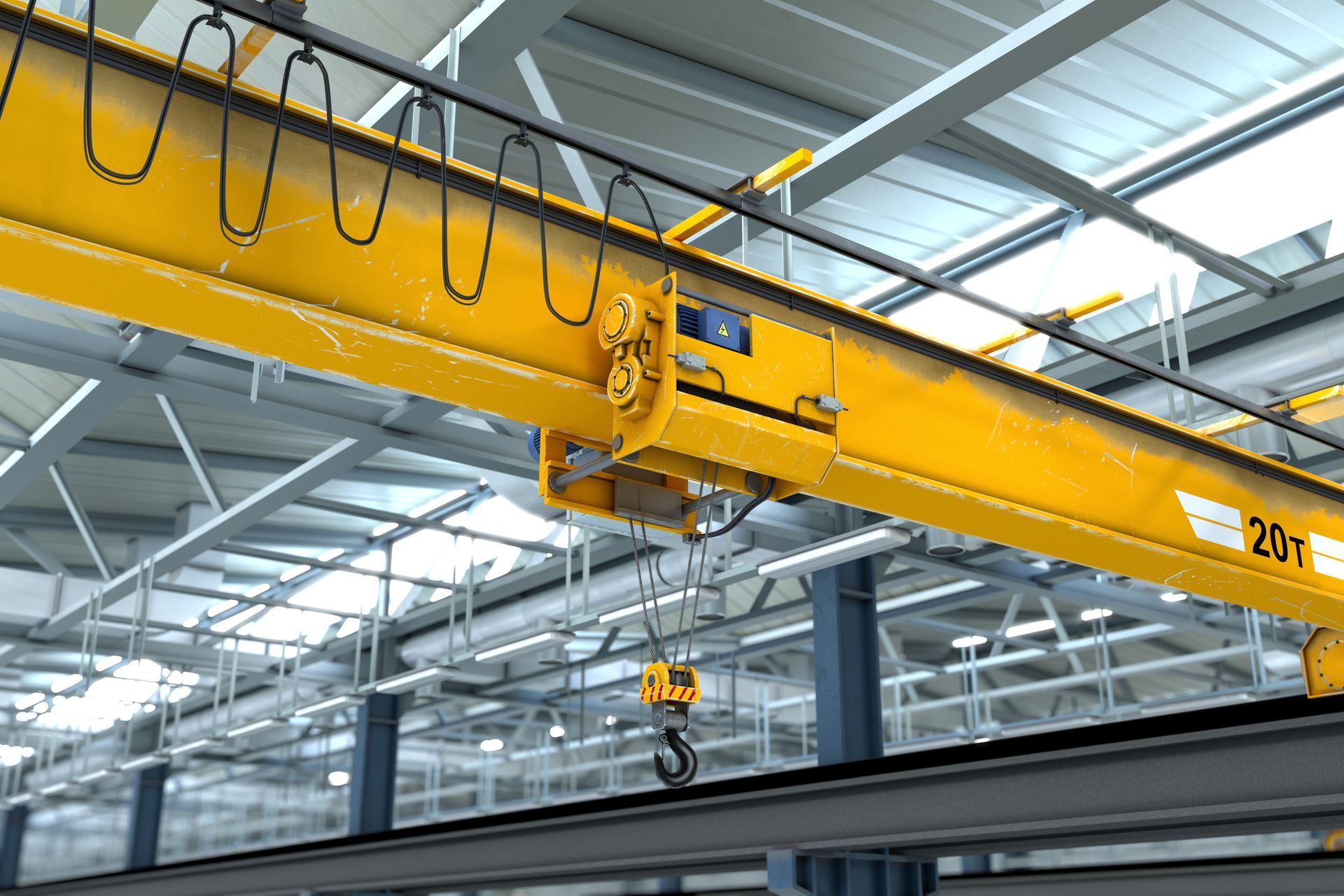 Yellow overhead crane in a factory.