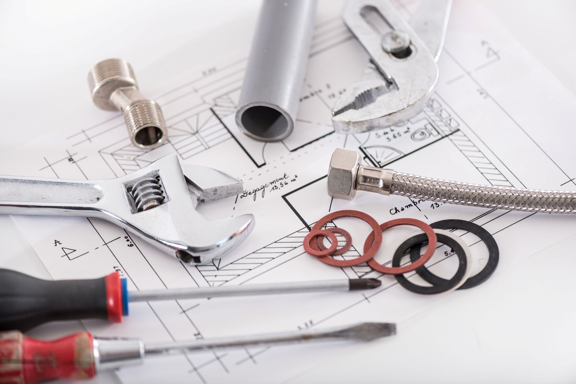 Set of plumbing materials, showcasing professional plumbing services tools and fittings.
