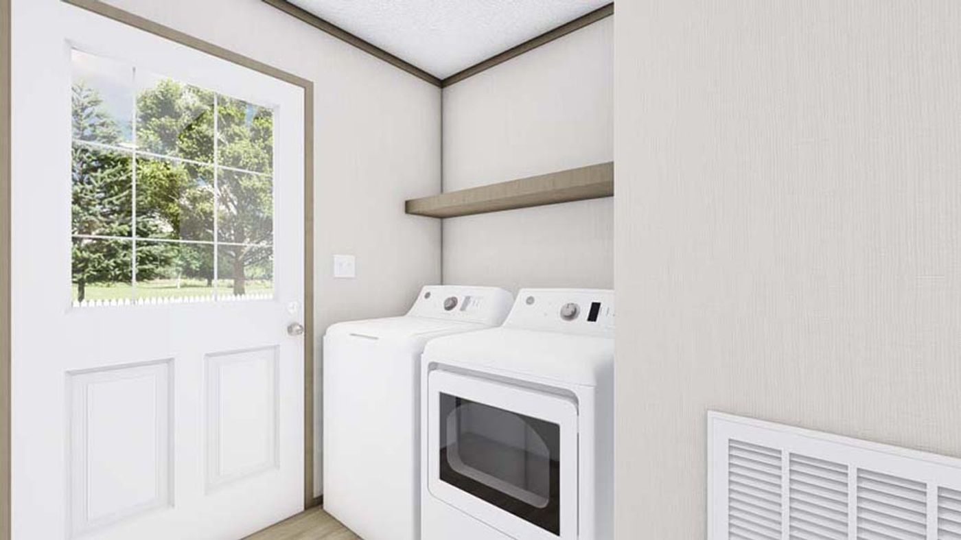 A laundry room with a washer and dryer and a window.