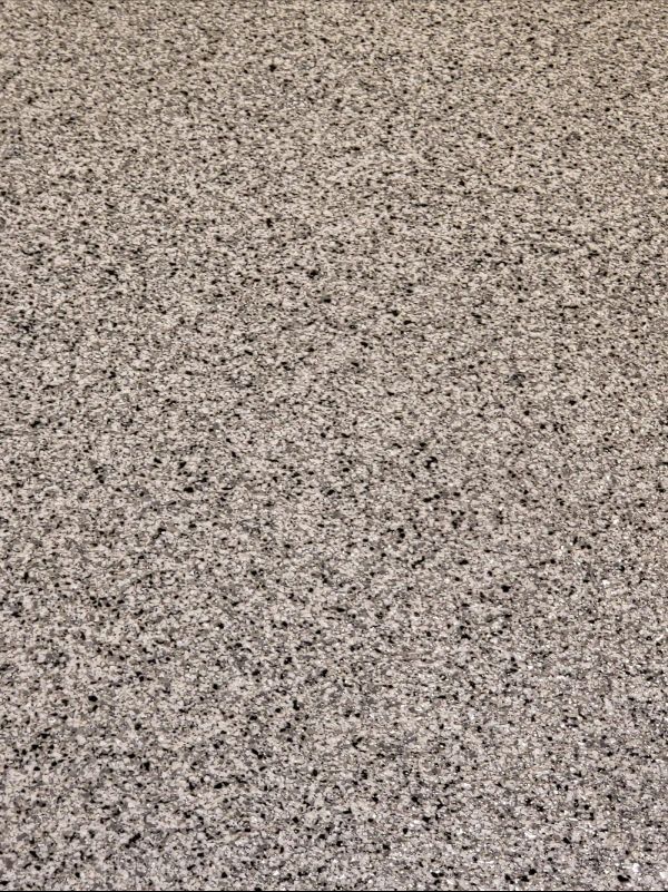 Granite countertop with speckled gray and black pattern.