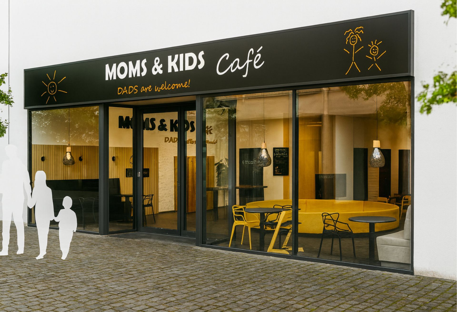 Außenansicht des „Moms & Kids Café“ mit schwarzer Markise und großen Fenstern.