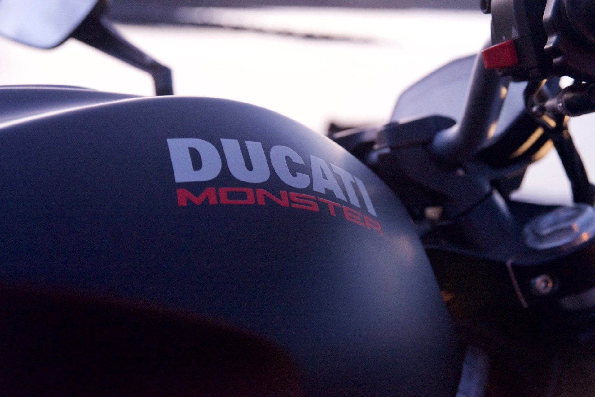 A close up of a ducati monster motorcycle