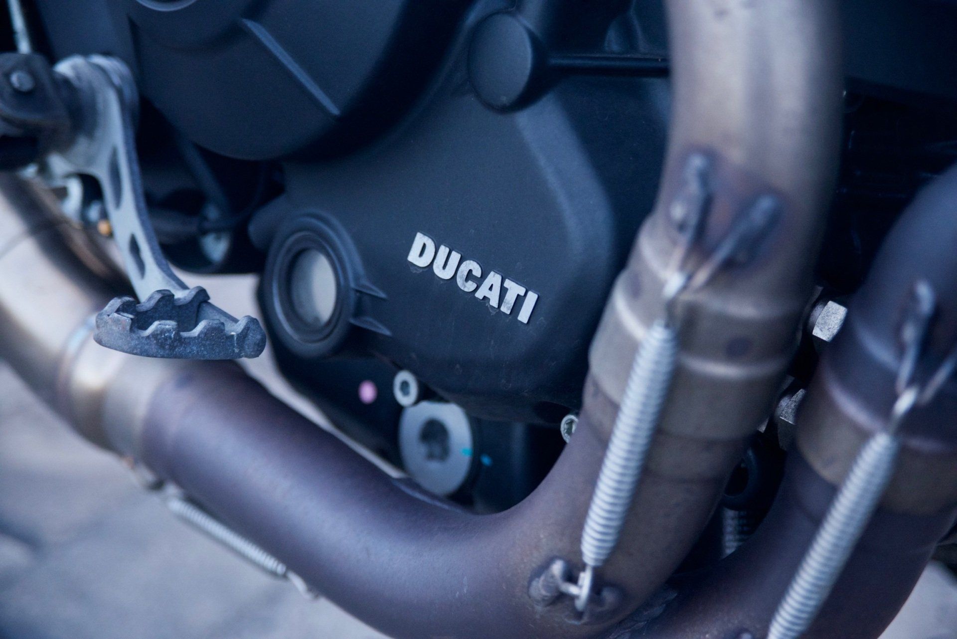 A close up of the engine of a ducati motorcycle.