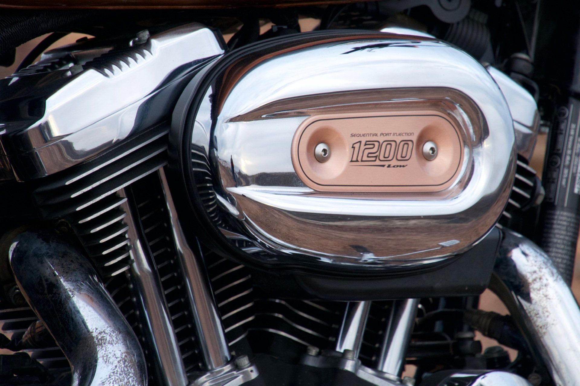 A close up of a harley davidson motorcycle engine