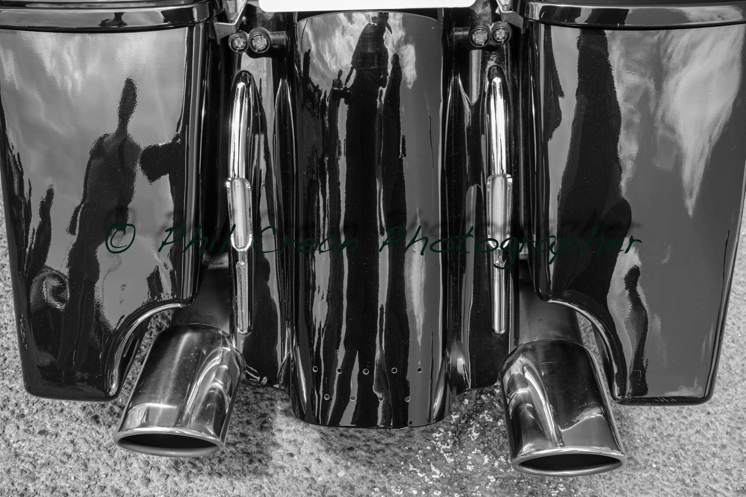 A black and white photo of a harley davidson motorcycle