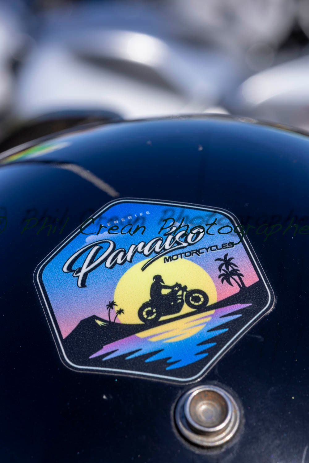A helmet with a sticker on it that says paradise