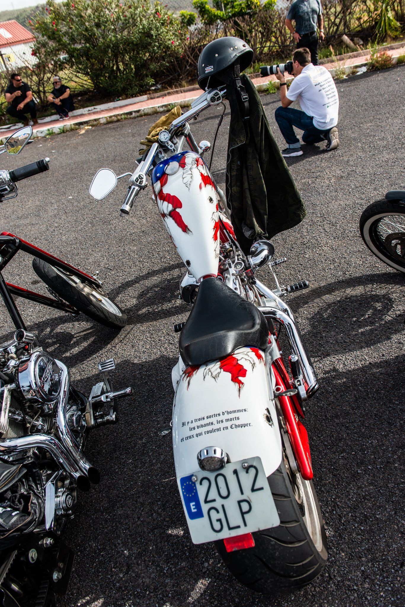 A motorcycle with a license plate that says 2012 glp