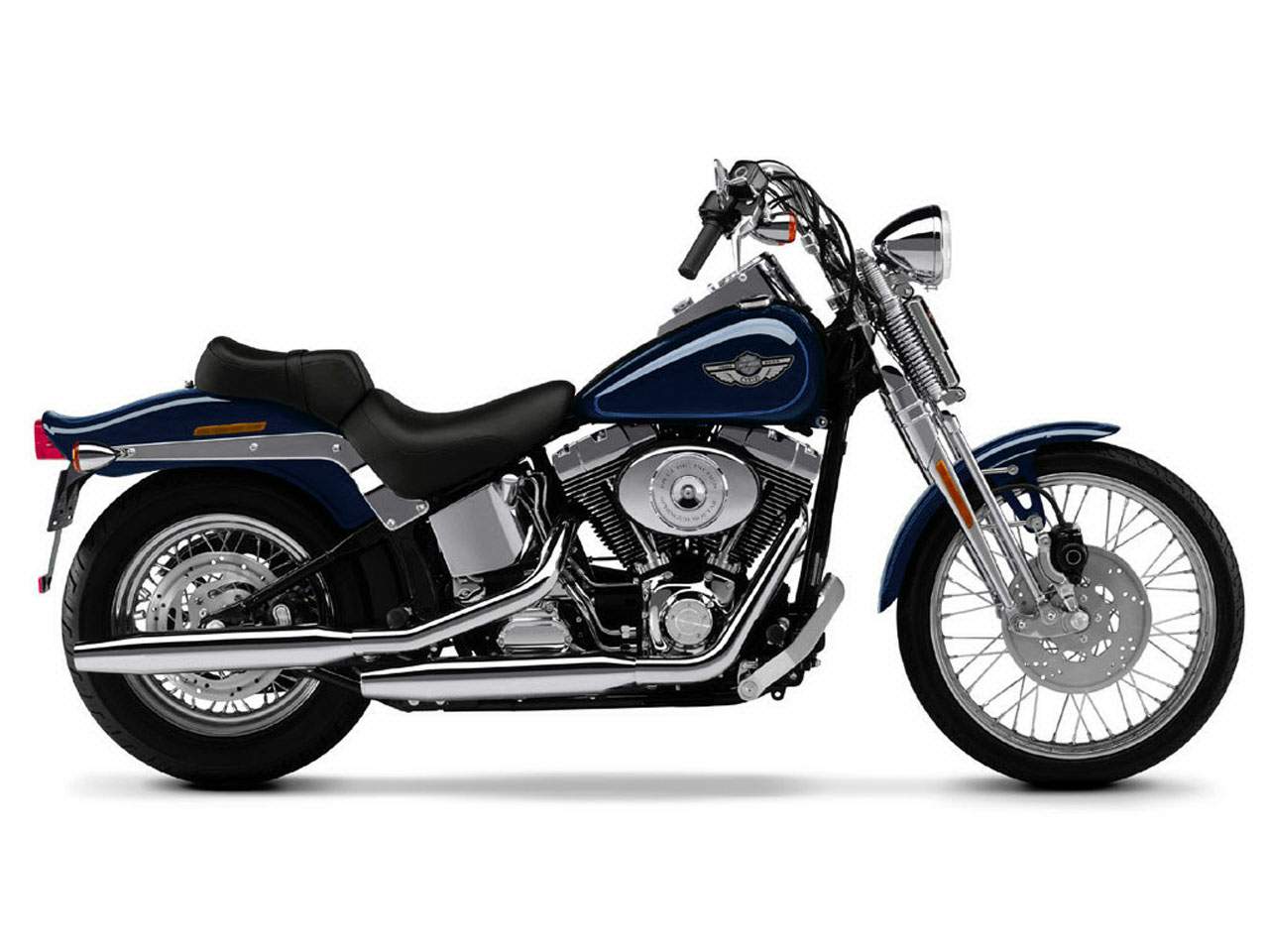 A blue harley davidson motorcycle is shown on a white background.